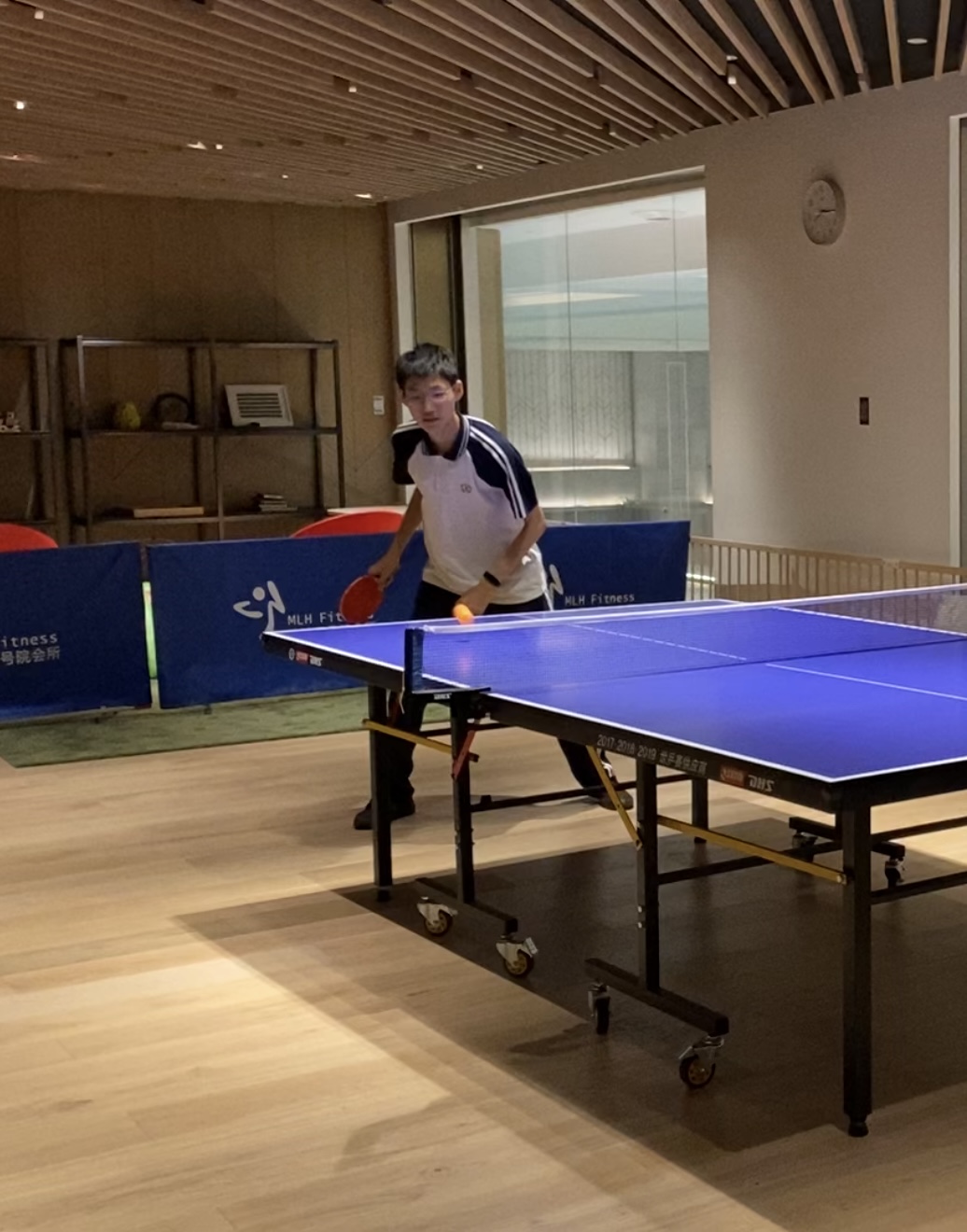 Playing table tennis indoors